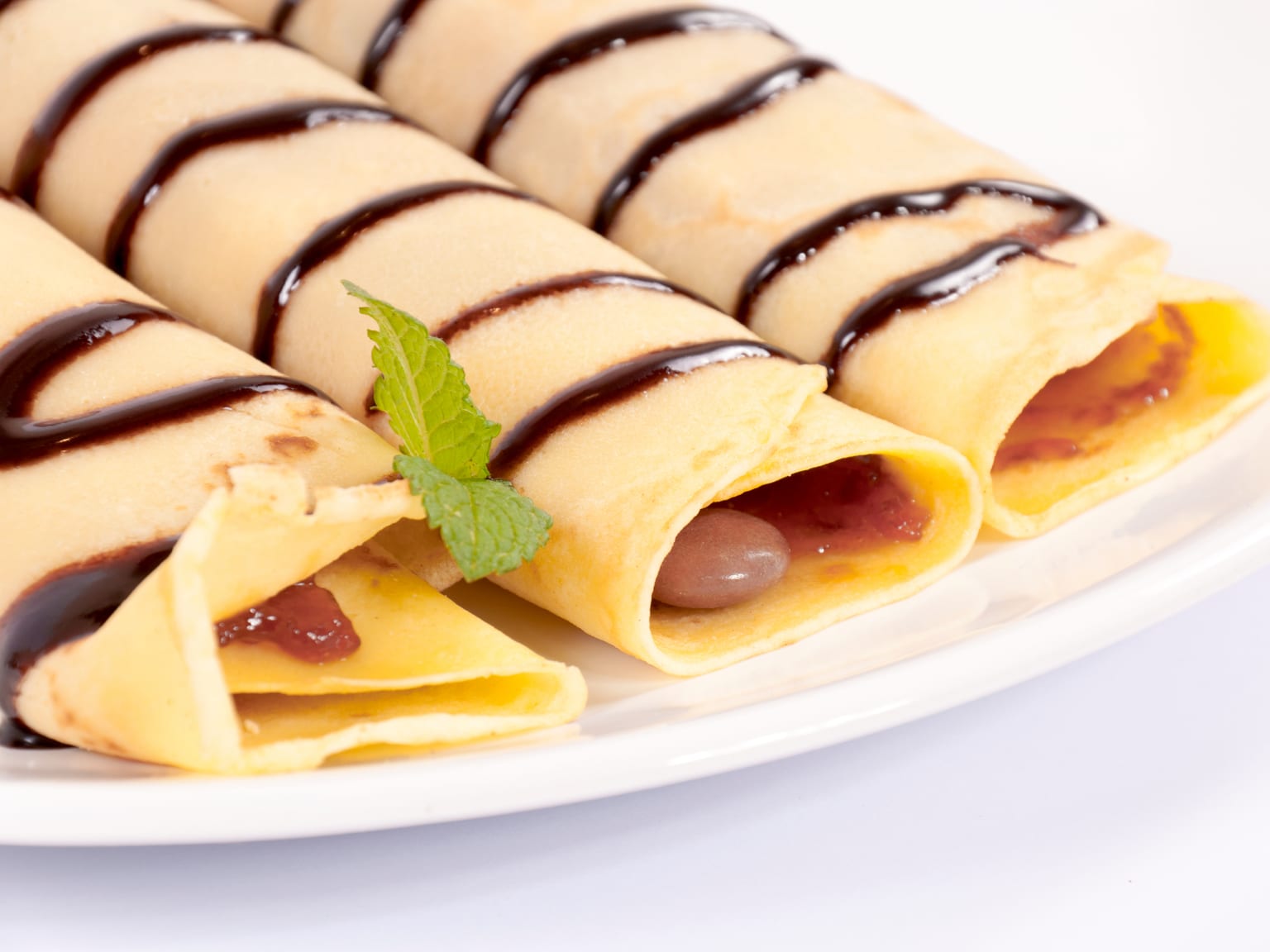 Classic French crêpes served as a natural-light editorial food photograph
