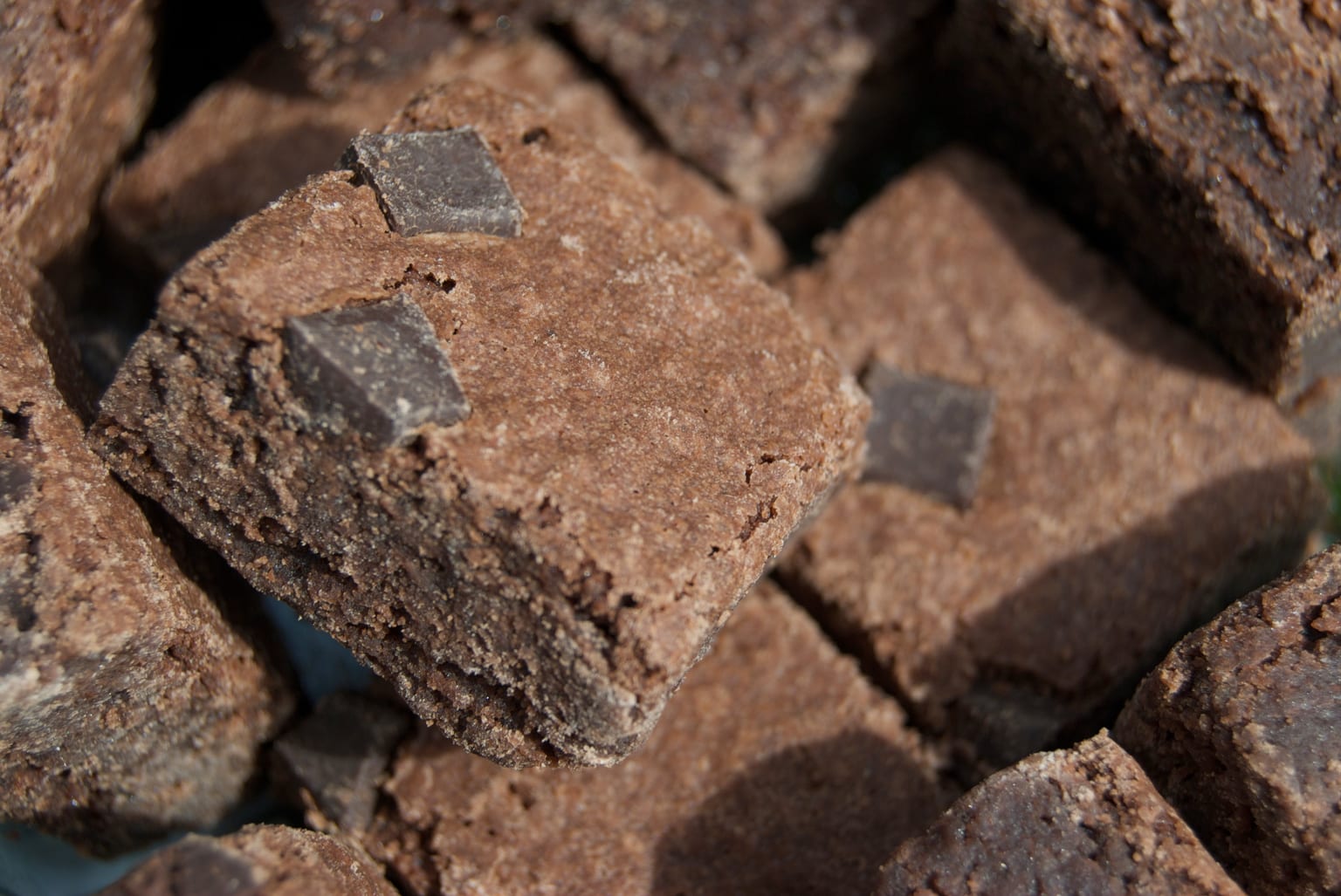 Gluten-free almond-flour brownies arranged for serving